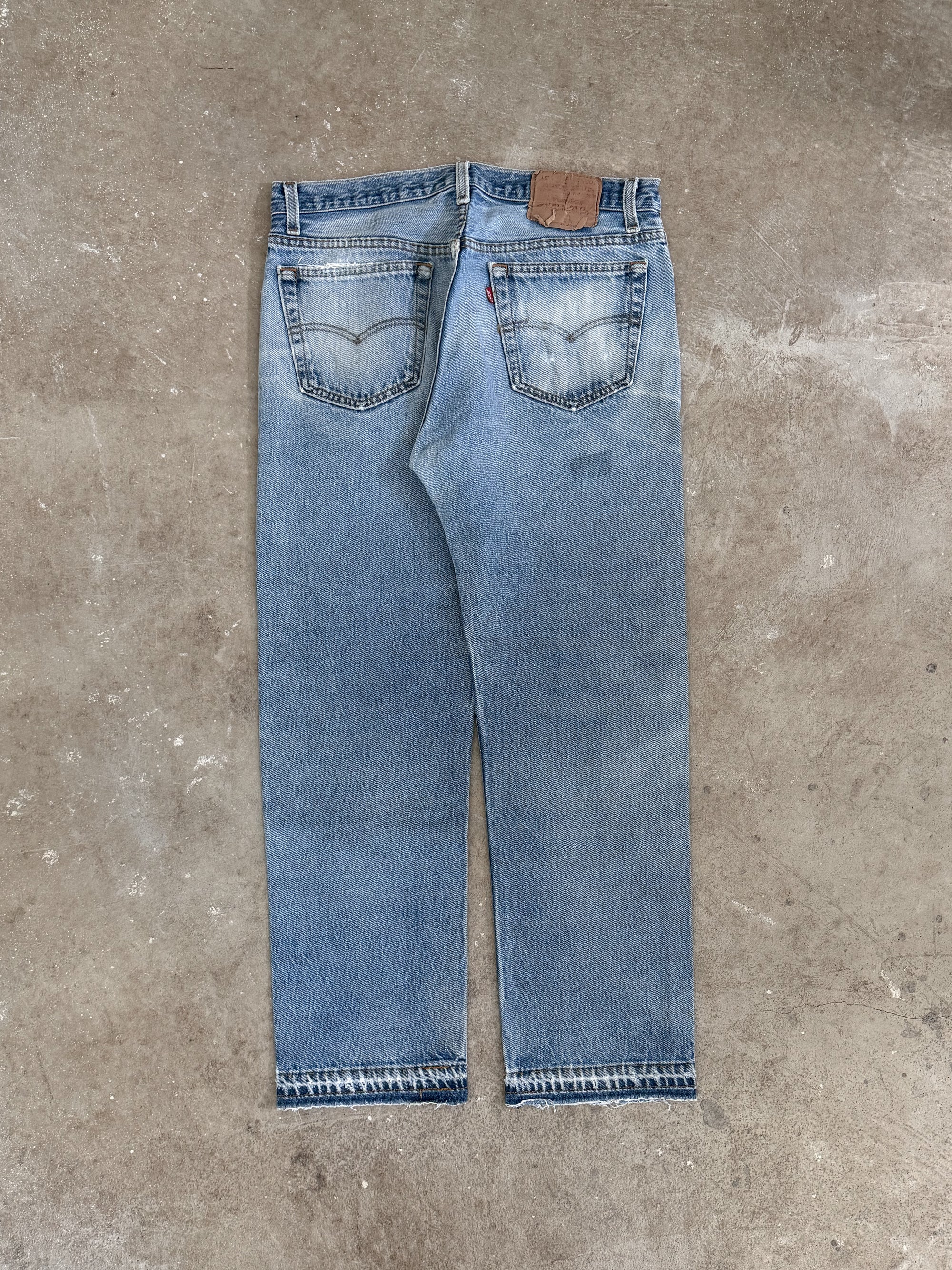 1990s Levis Repaired Faded Blue 501 Released Hem (32X27)