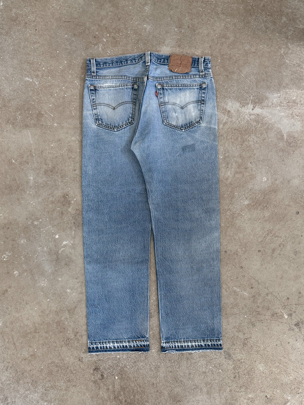 1990s Levis Repaired Faded Blue 501 Released Hem (32X27)