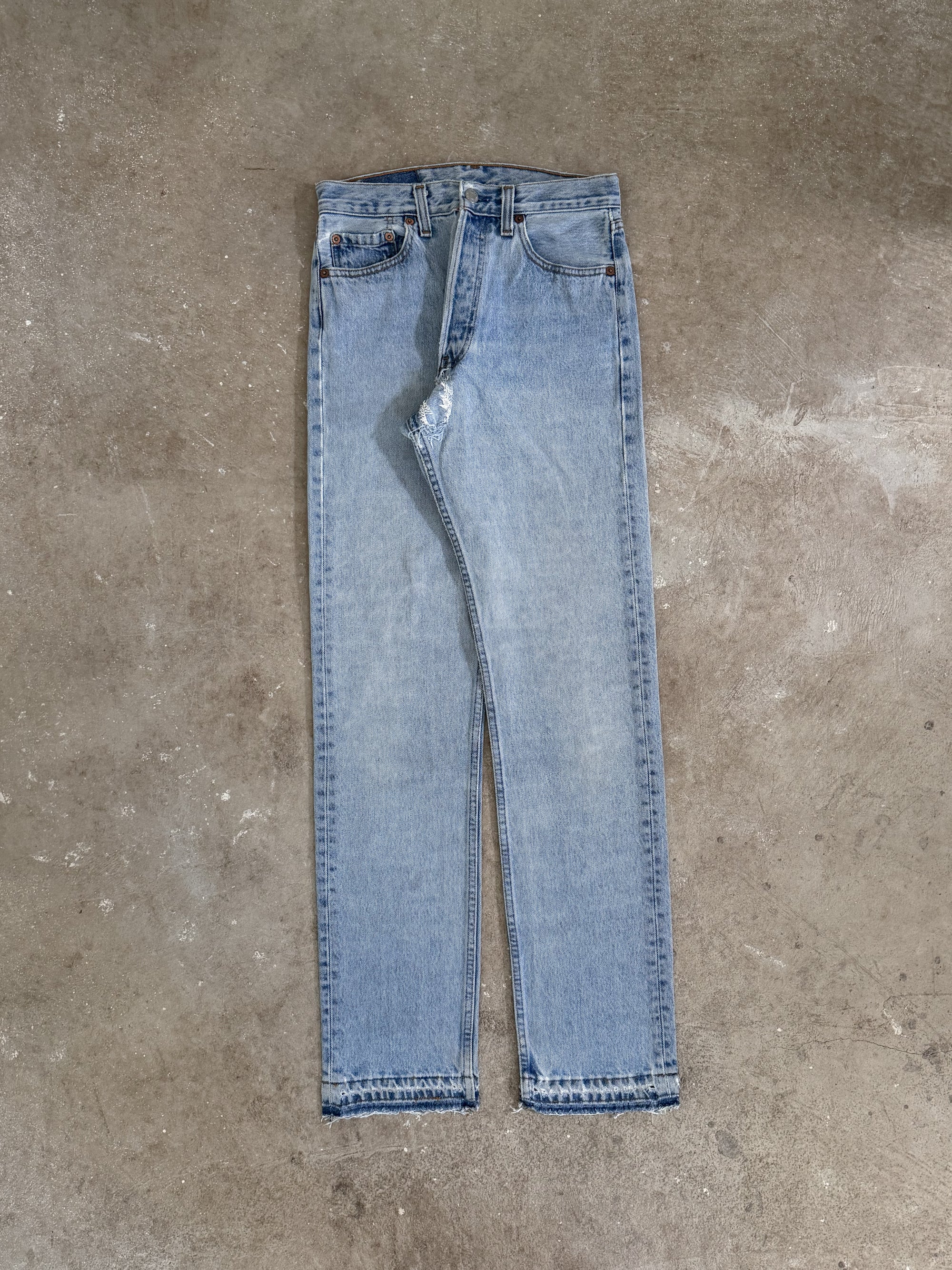 1990s Levis Faded Blue 501 Released Hem (27X32)