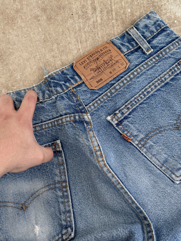 1990s Orange Tab Levis Faded Blue 505 Released Hem (33X29)