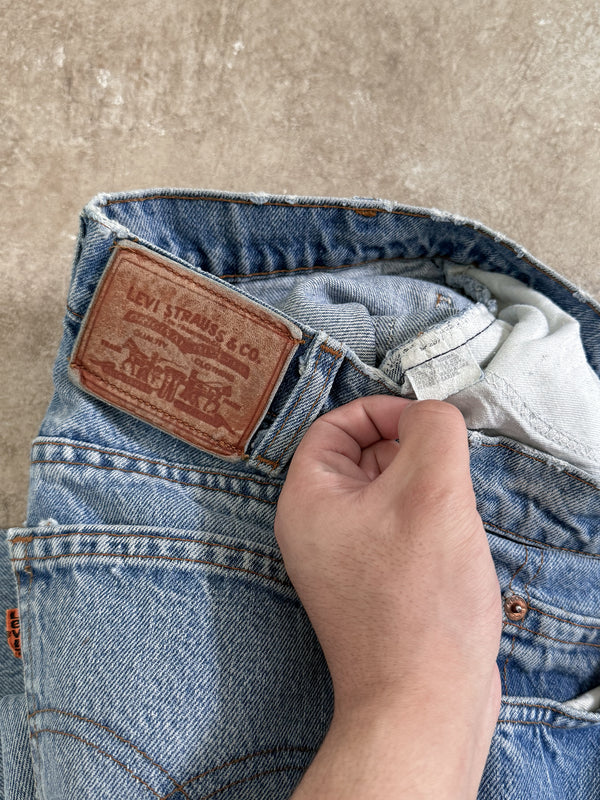 1980s Orange Tab Levis Faded Blue 502 (26X33)