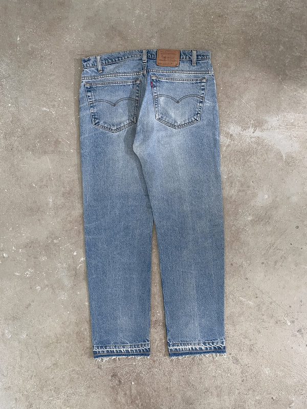 1990s Levi’s Patch Repaired Blue 505 Released Hem (36X31)