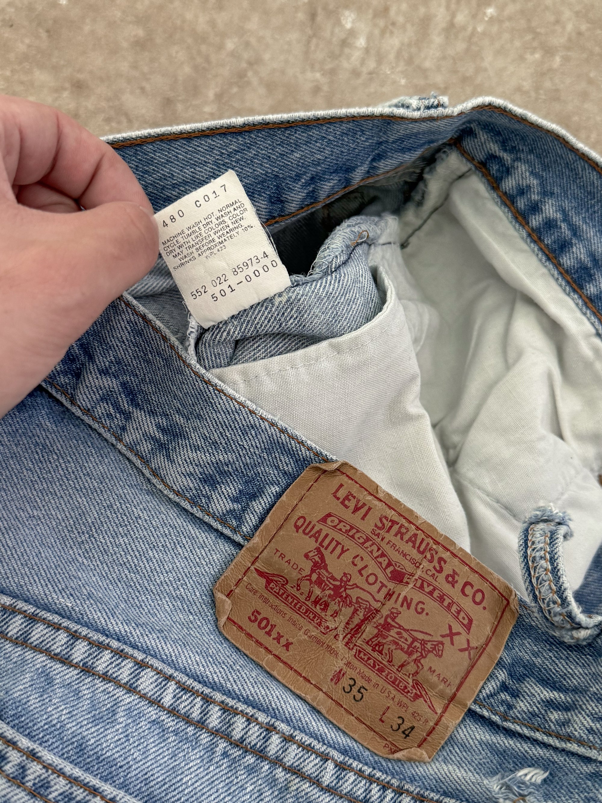 1990s Levis Faded Blue 501 Released Hem (32X31)