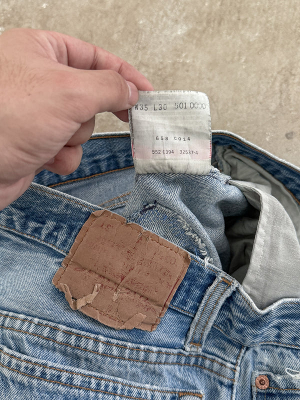 1990s Levis Repaired Faded Blue 501 Released Hem (32X27)