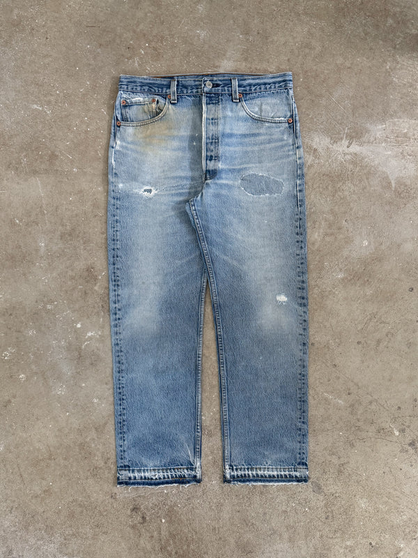 1990s Levis Repaired Faded Blue 501 Released Hem (32X27)