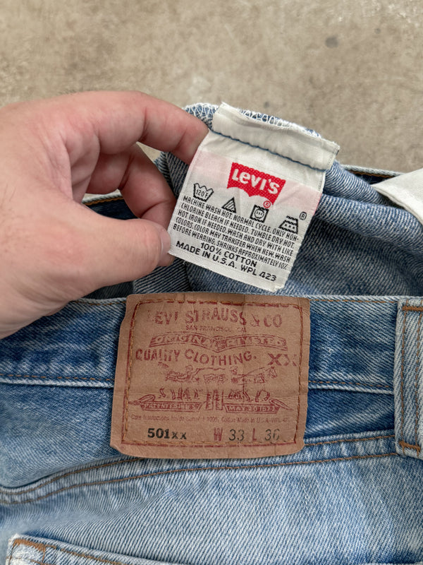 1990s Levis Faded Blue 501 Released Hem (31X30)