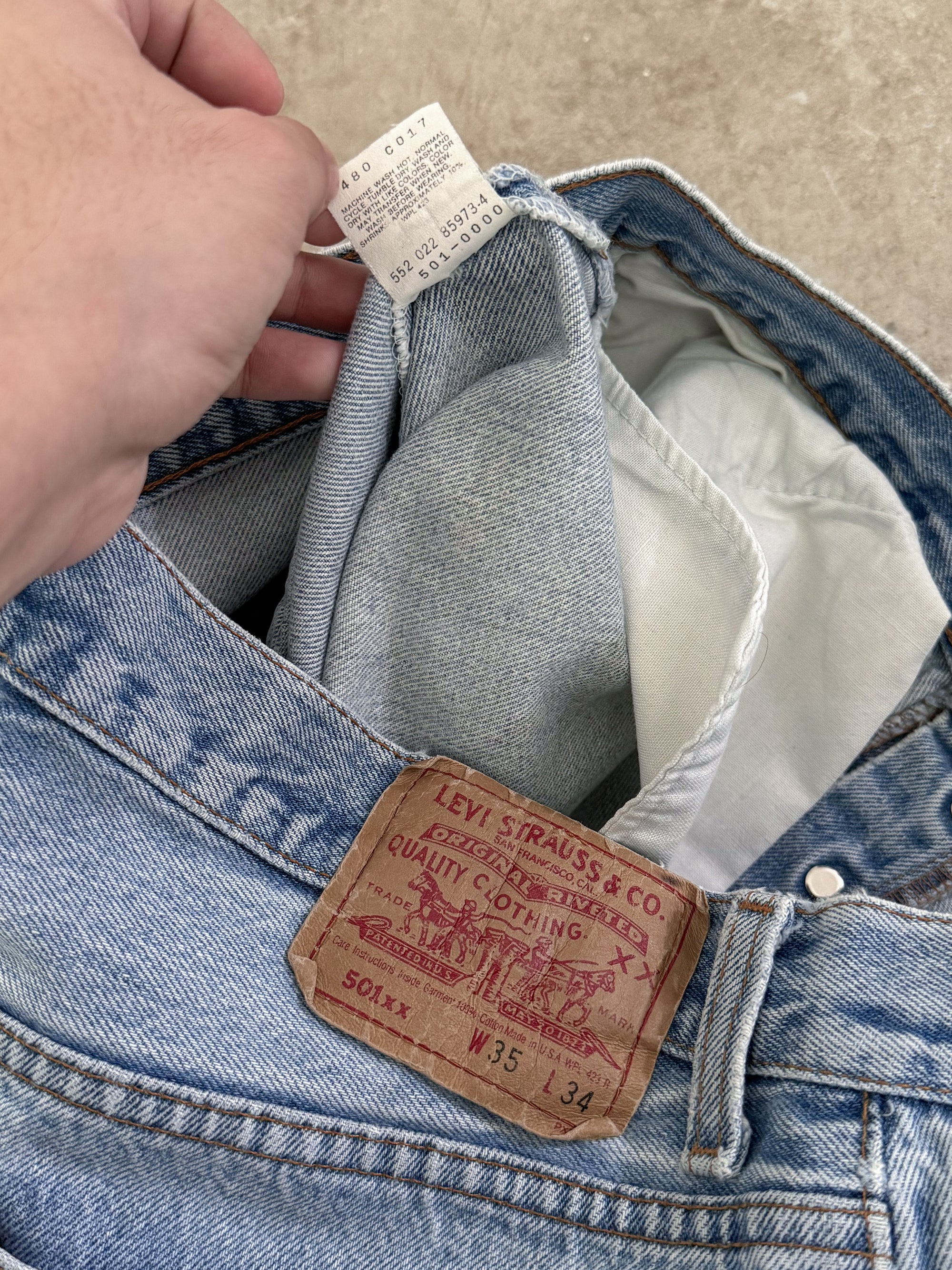 1990s Levis Faded Blue 501 Released Hem (32X31)