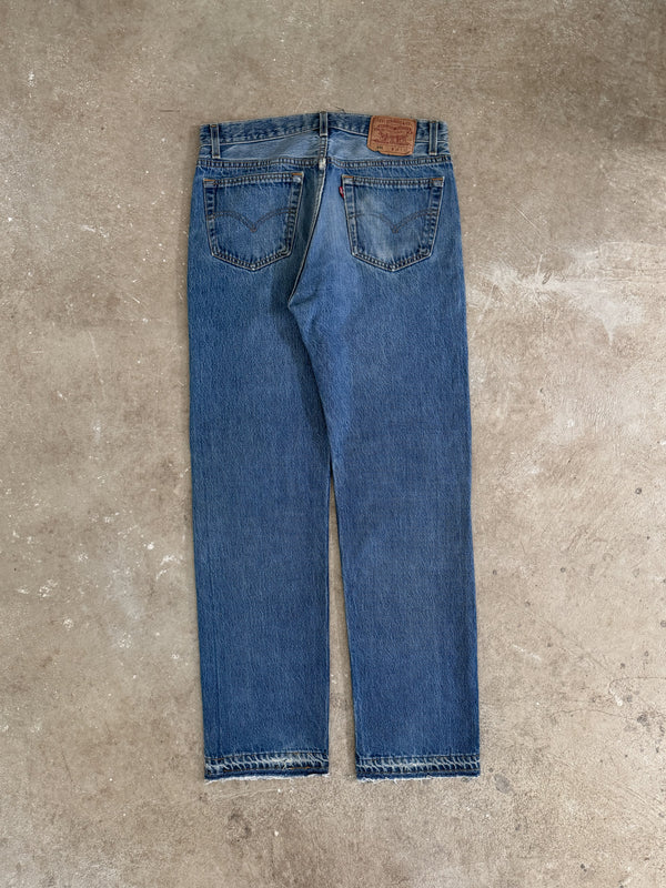 1990s Levis Repaired Faded Blue 501 Released Hem (32X31)