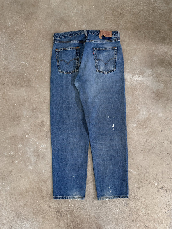 1990s Levis Faded Blue 518 (33X31)