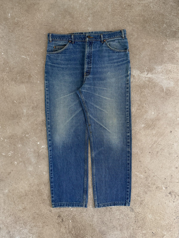 1990s Orange Tab Levis Faded Blue 505 (37X29)