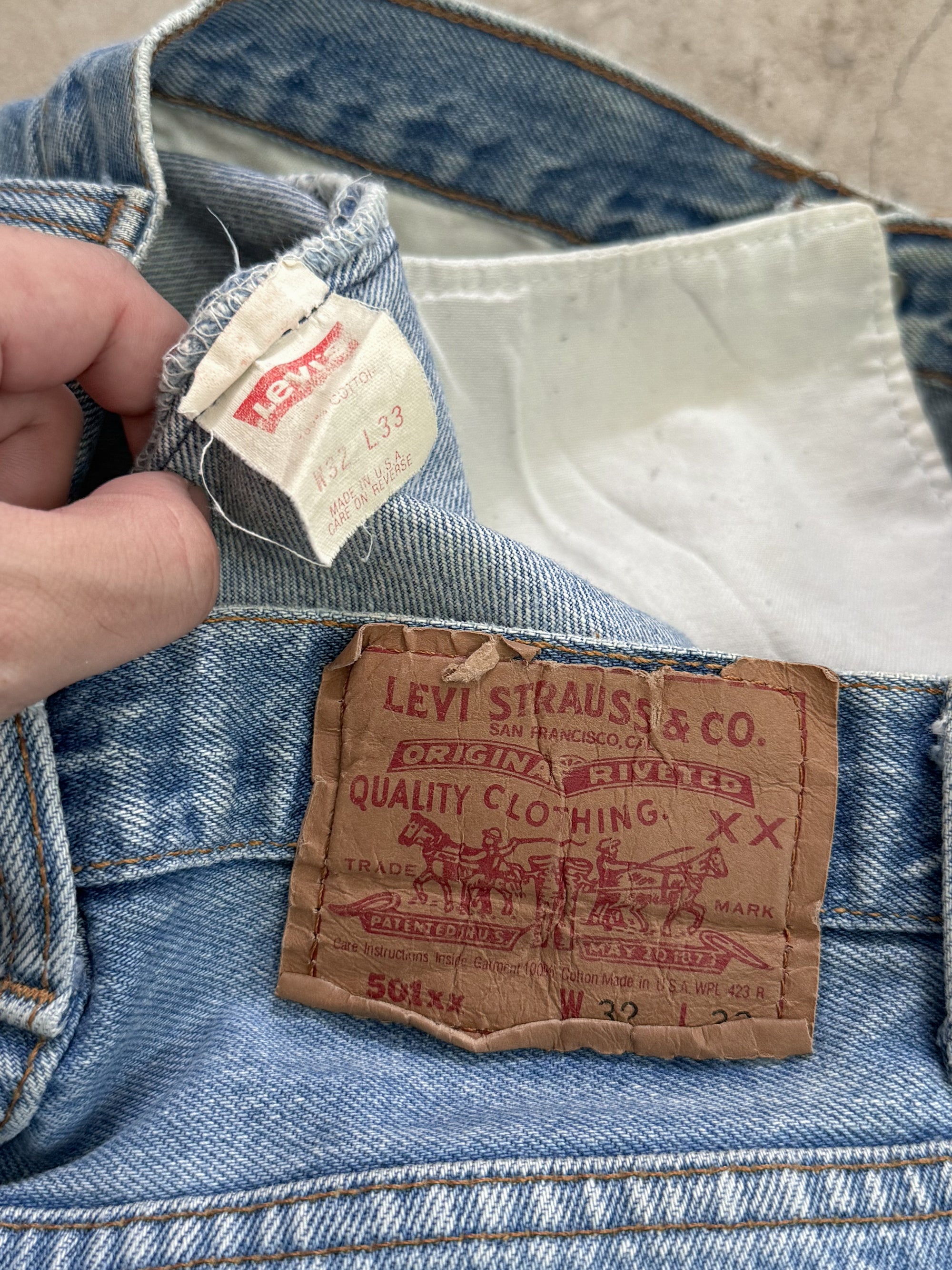 1990s Levis Faded Blue 501 Released Hem (29X30)