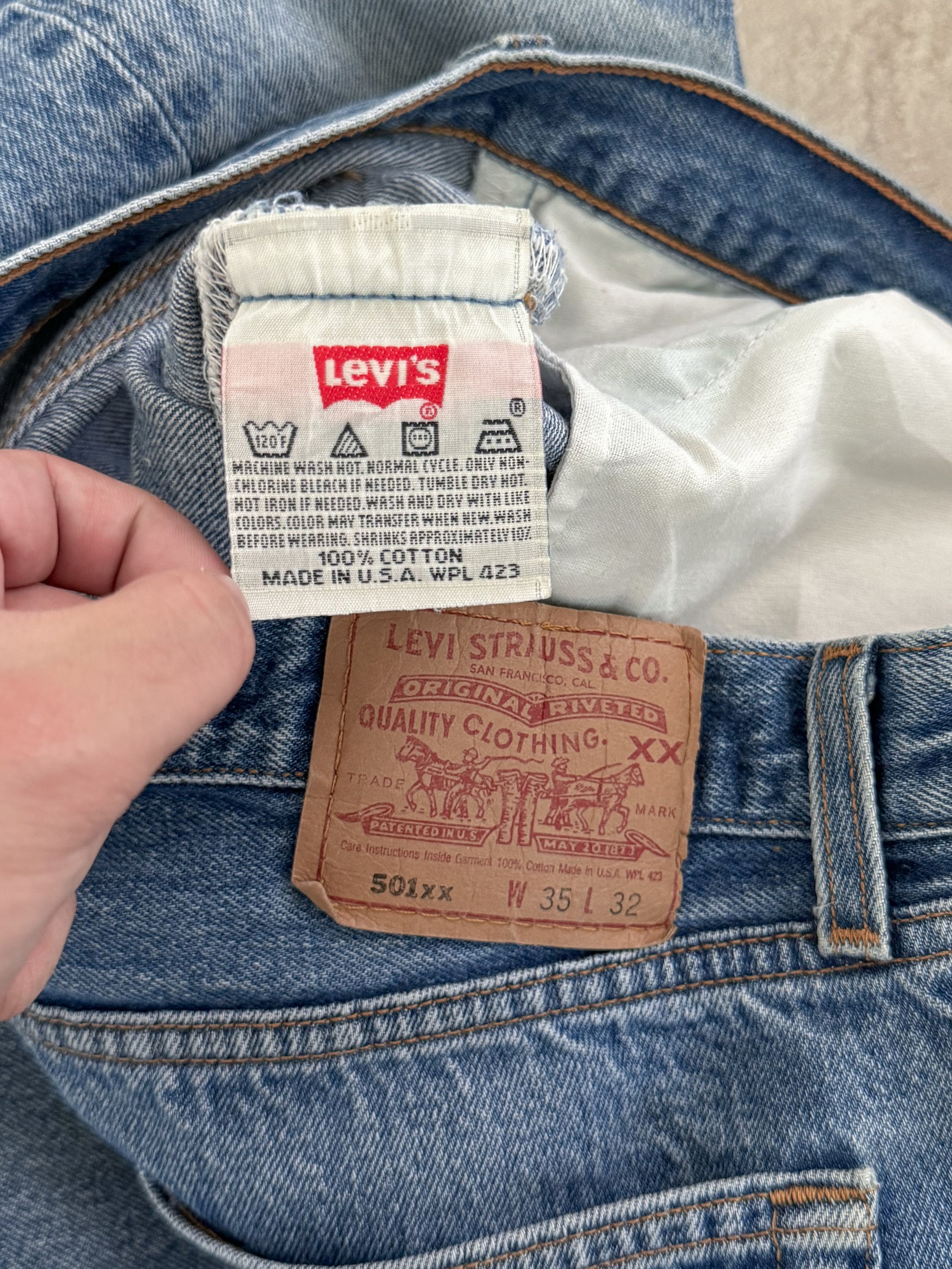 1990s Levis Faded Blue 501 Released Hem (33X29)