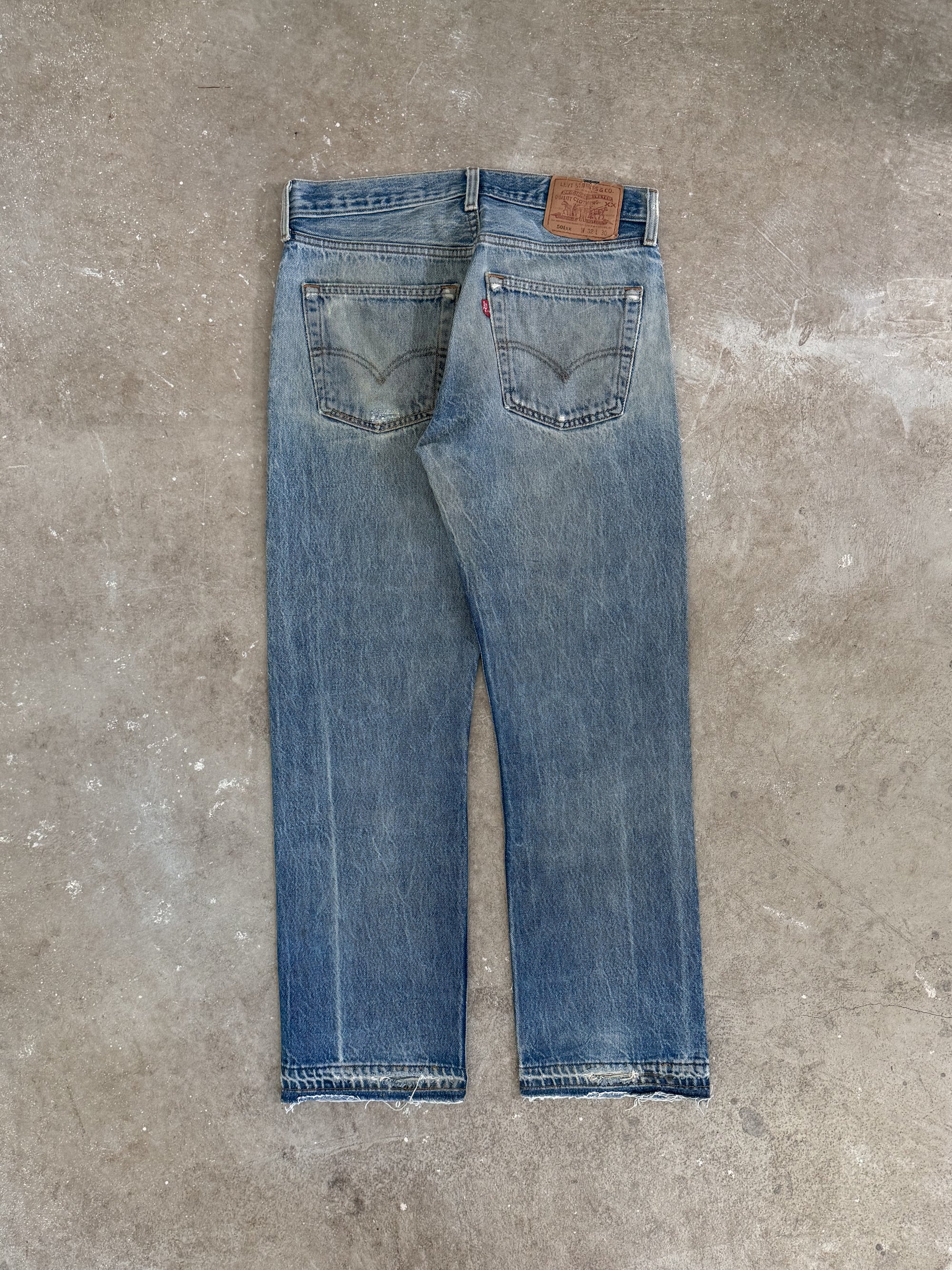 1990s Levis Repaired Faded Blue 501 Released Hem (29X27)