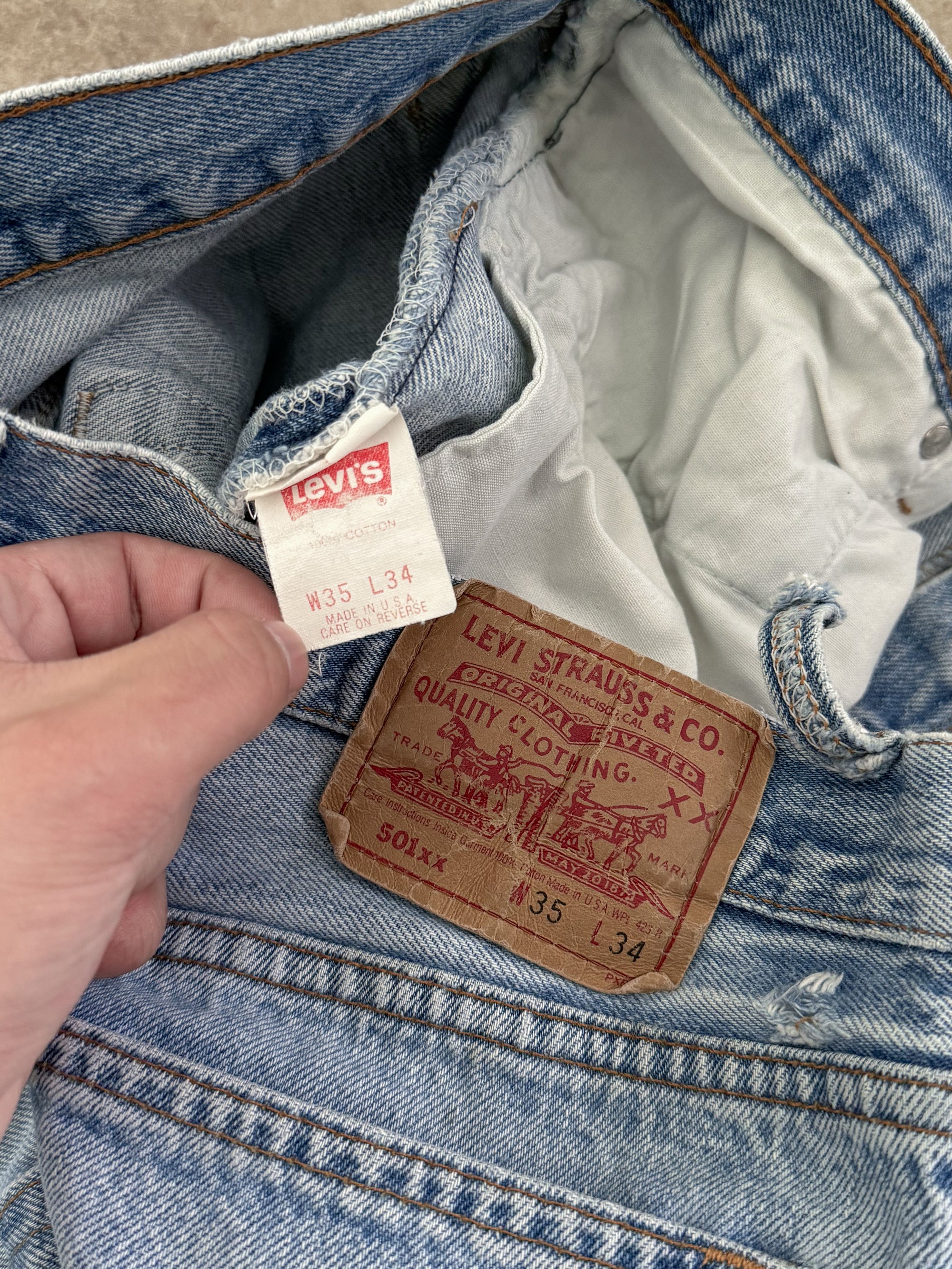 1990s Levis Faded Blue 501 Released Hem (32X31)