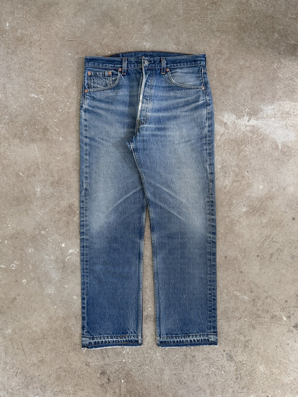 1990s Levis Faded Blue 501 Released Hem (33X29)