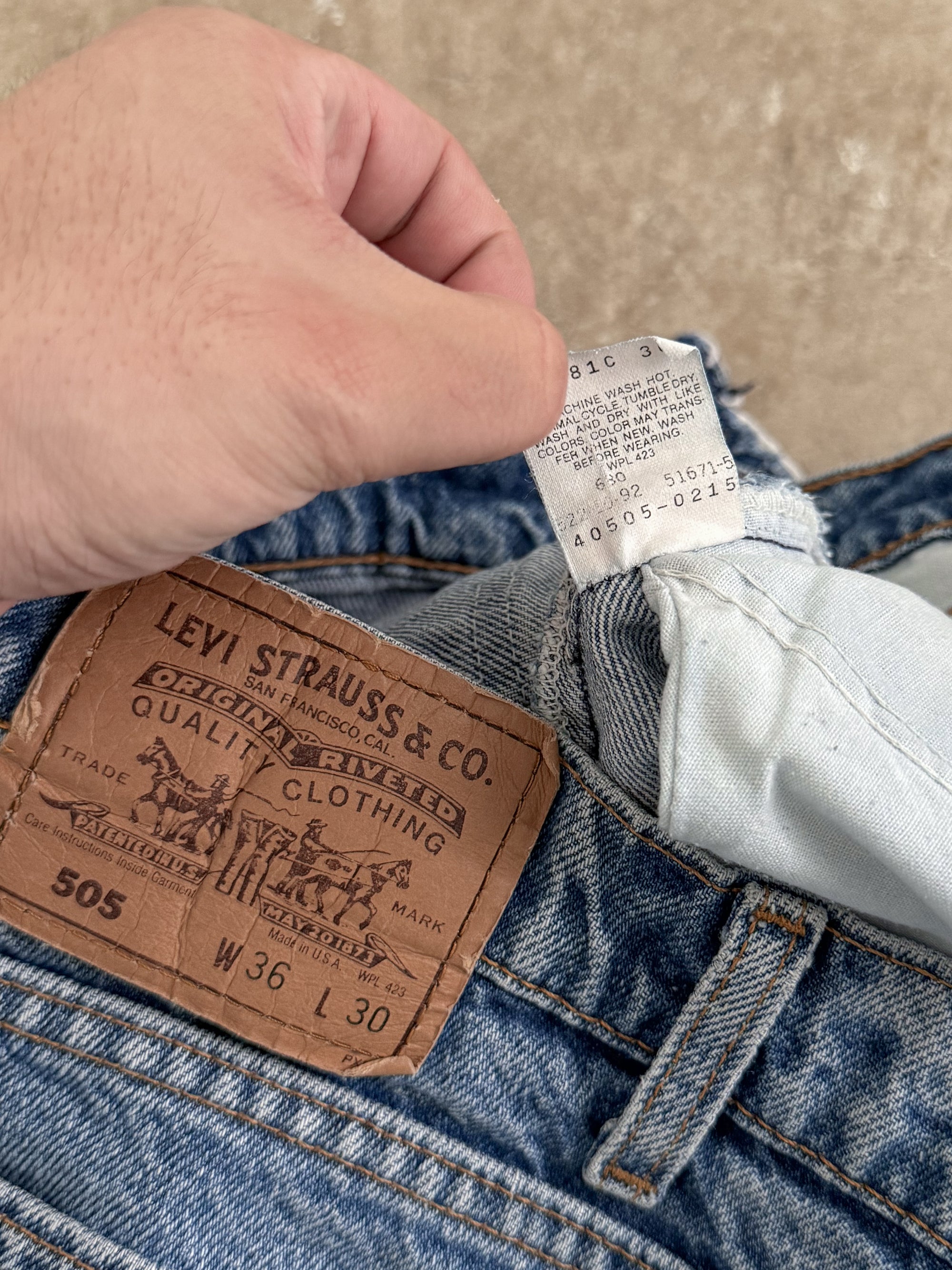 1990s Orange Tab Levis Faded Blue 505 Released Hem (33X29)