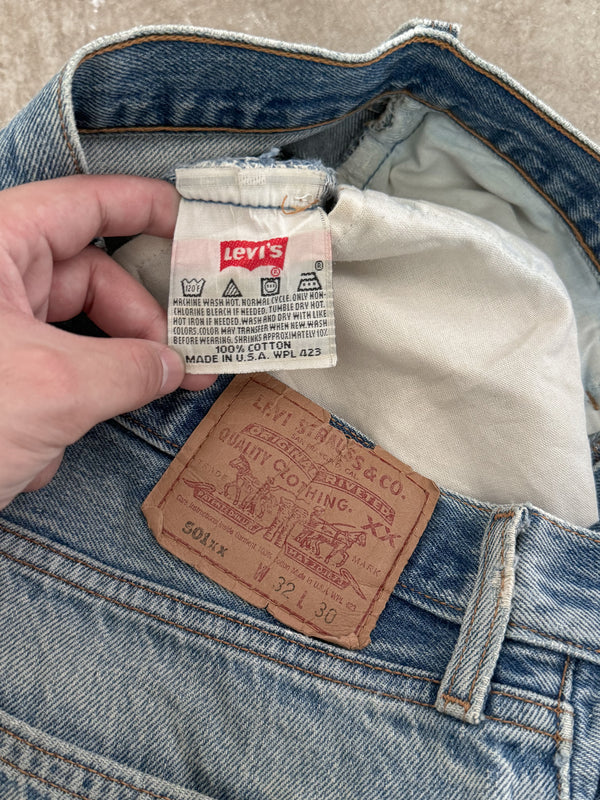 1990s Levis Repaired Faded Blue 501 Released Hem (29X27)