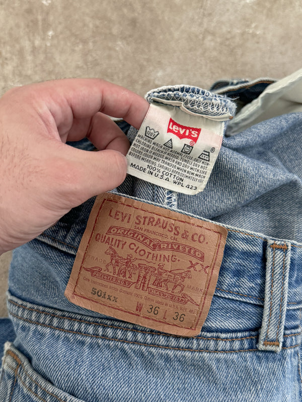 1990s Levis Faded Blue 501 Raw Hem (33X27)