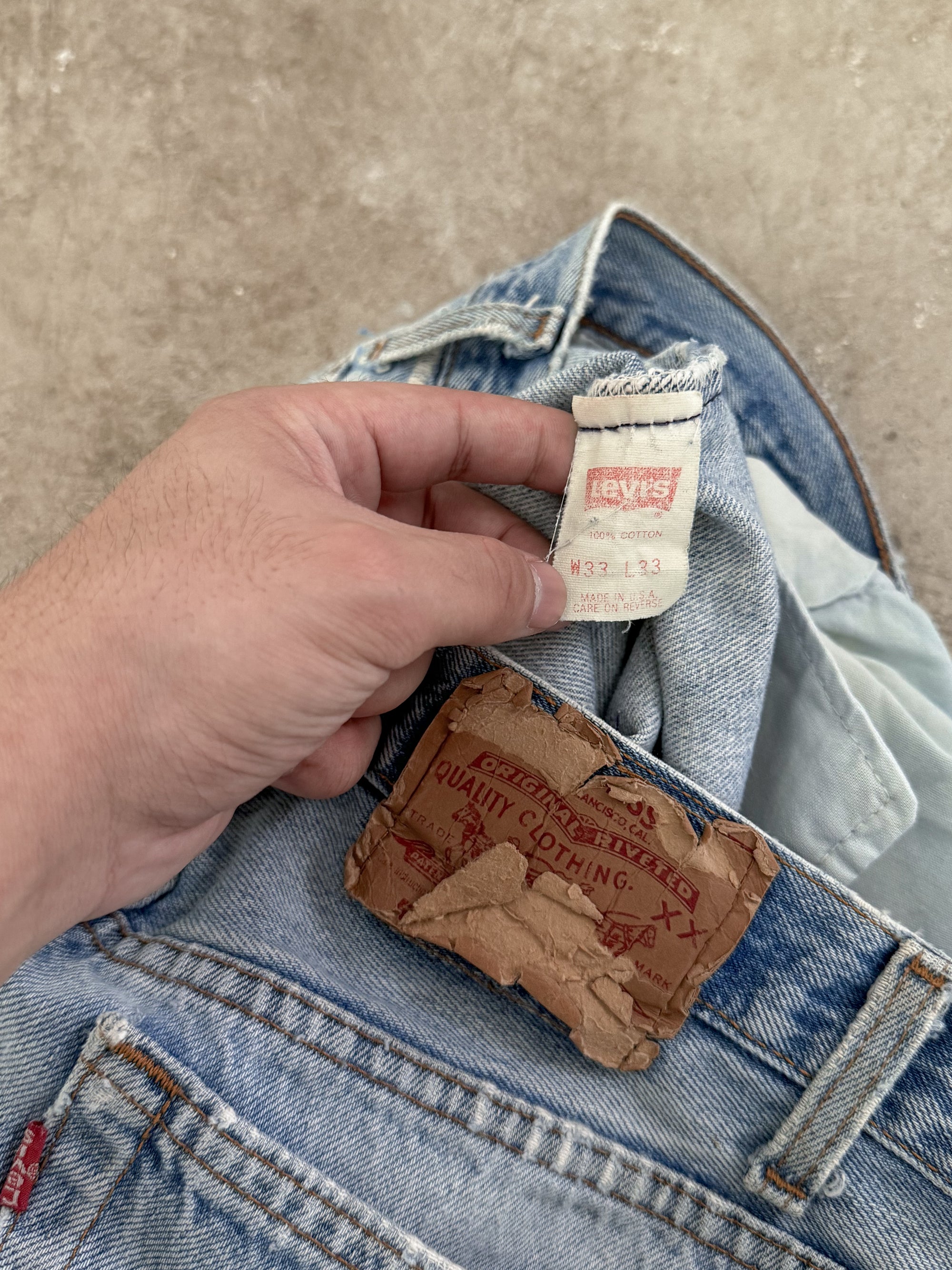 1990s Levis Distressed Faded Blue 501 Released Hem (30X32)