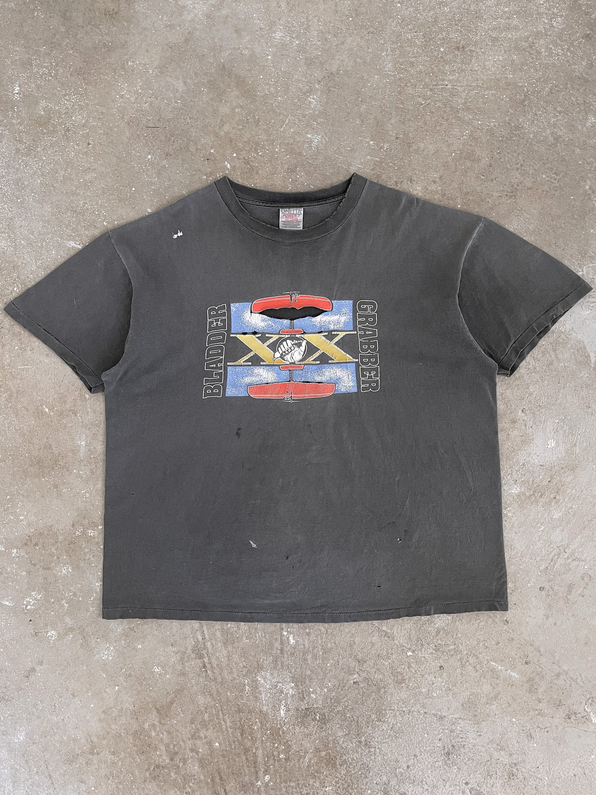 1990s “Bladder Grabber” Distressed Faded Single Stitched Tee (XL)