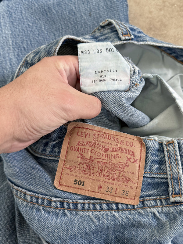 1990s Levis Repaired Faded Blue 501 (31X33)