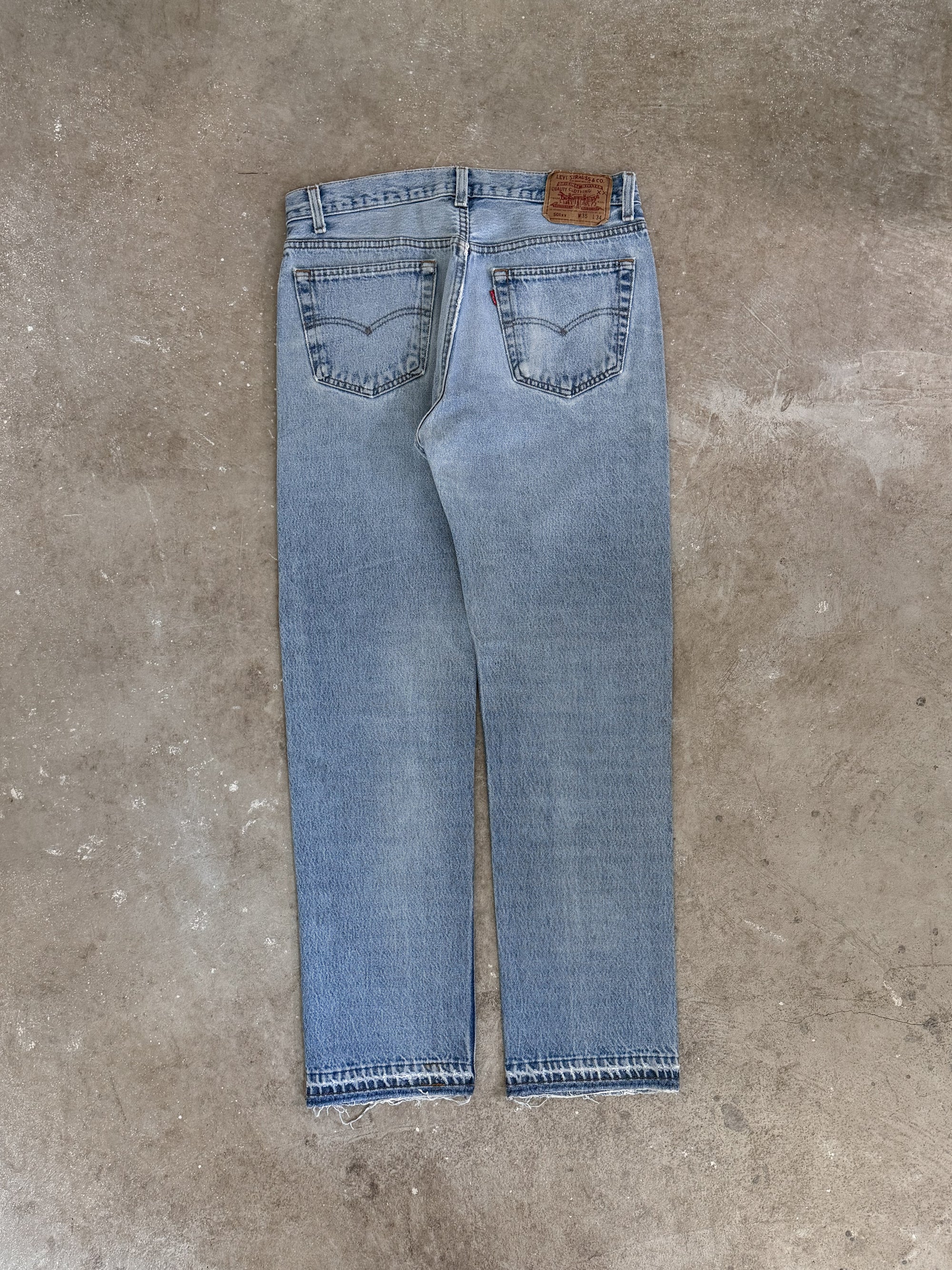 1990s Levis Faded Blue 501 Released Hem (32X31)