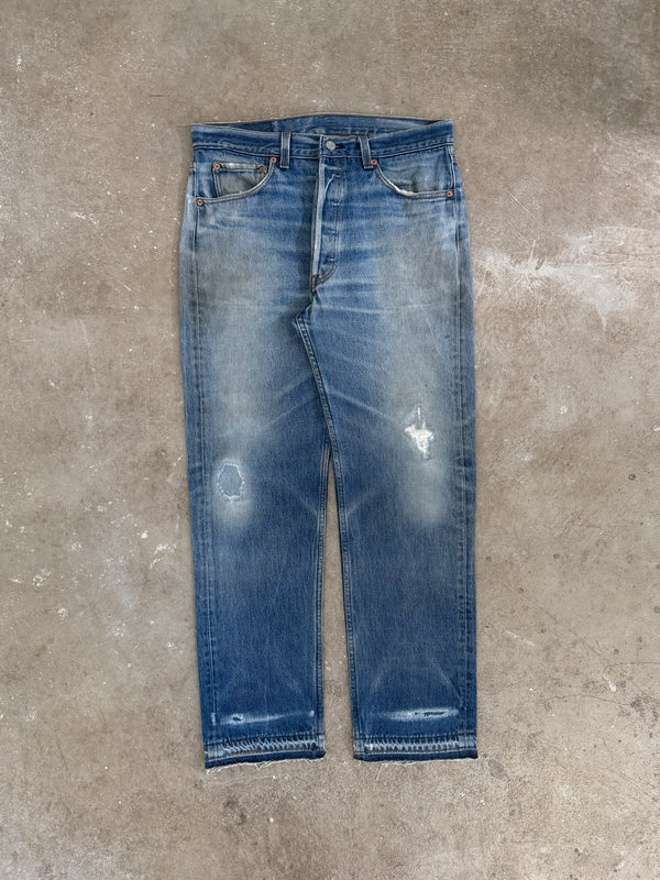 1990s Levis Repaired Faded Blue 501 Released Hem (33X29)