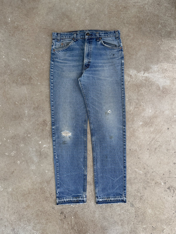 1980s/90s Orange Tab Levis Faded Blue 505 Released Hem (33X31)