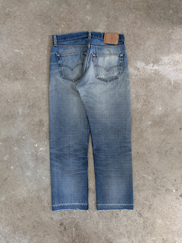 1990s Levis Faded Blue 501 Released Hem (30X27)