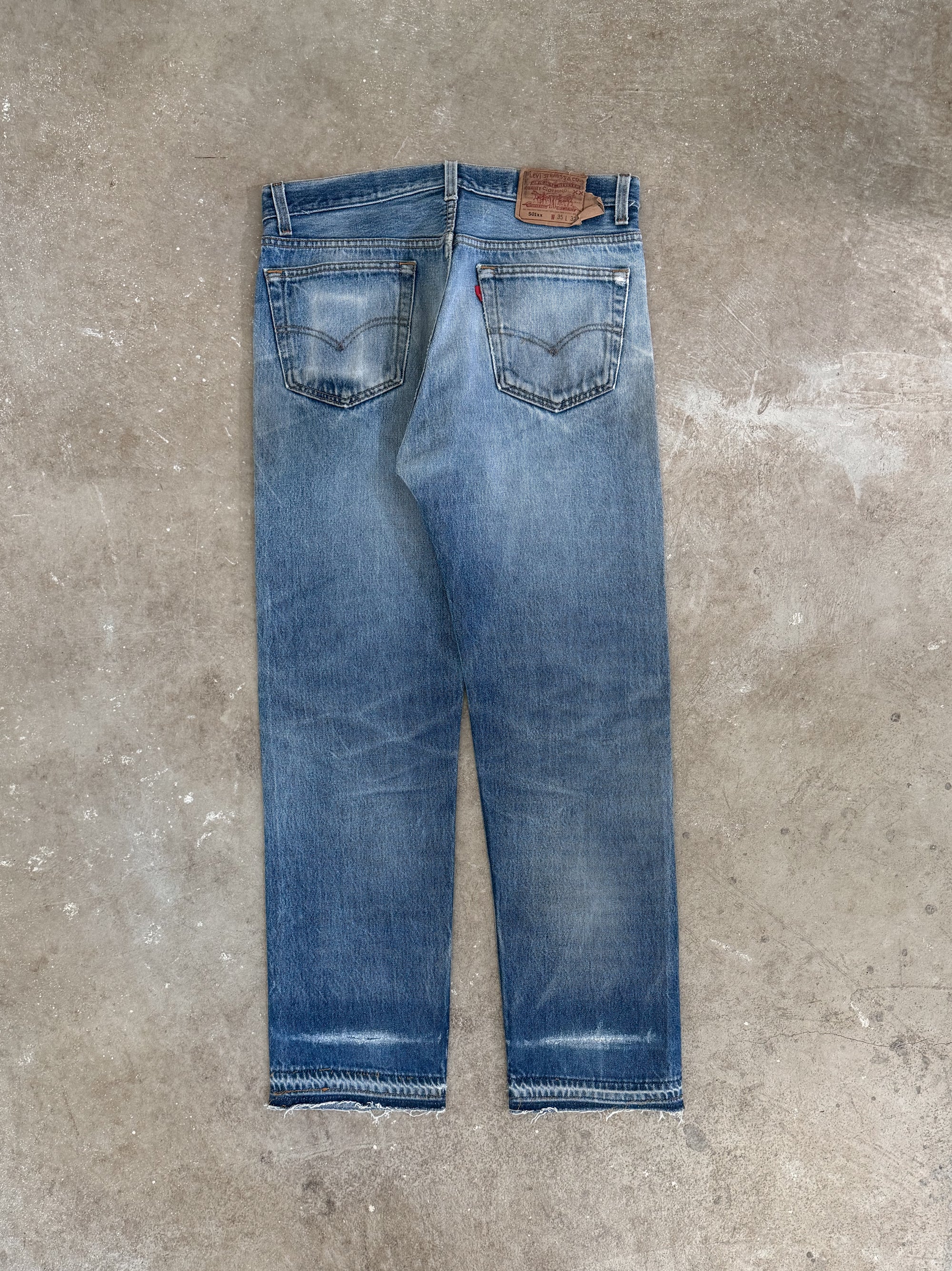 1990s Levis Repaired Faded Blue 501 Released Hem (33X29)