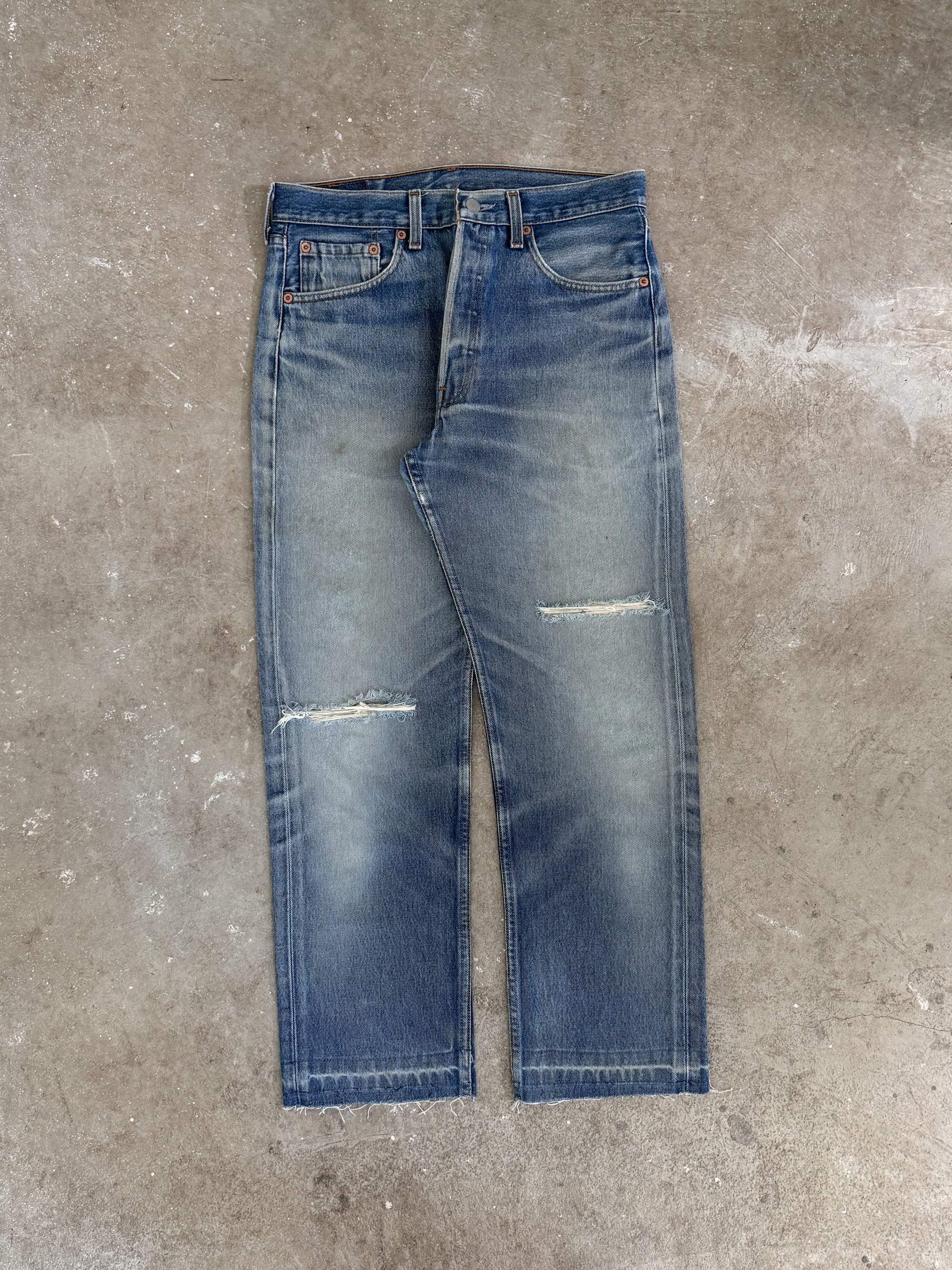 1990s Levis Faded Blue 501 Released Hem (30X27)