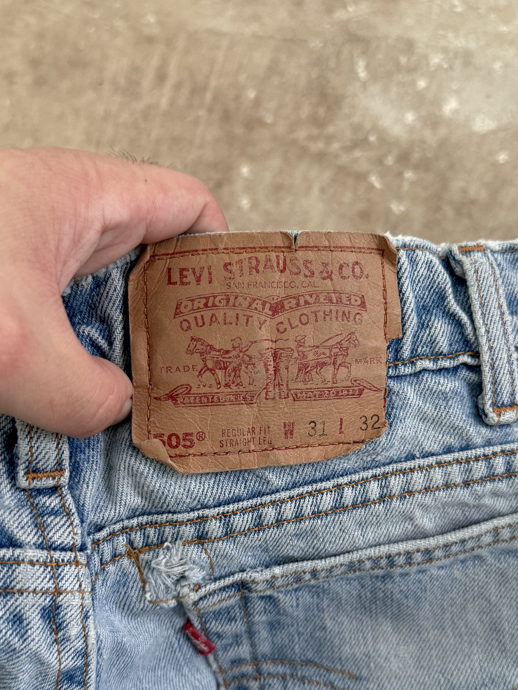 1990s Levis Faded Blue 505 Released Hem (30X32)