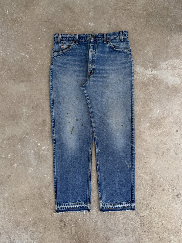 1990s Orange Tab Levis Faded Blue 505 Released Hem (33X29)