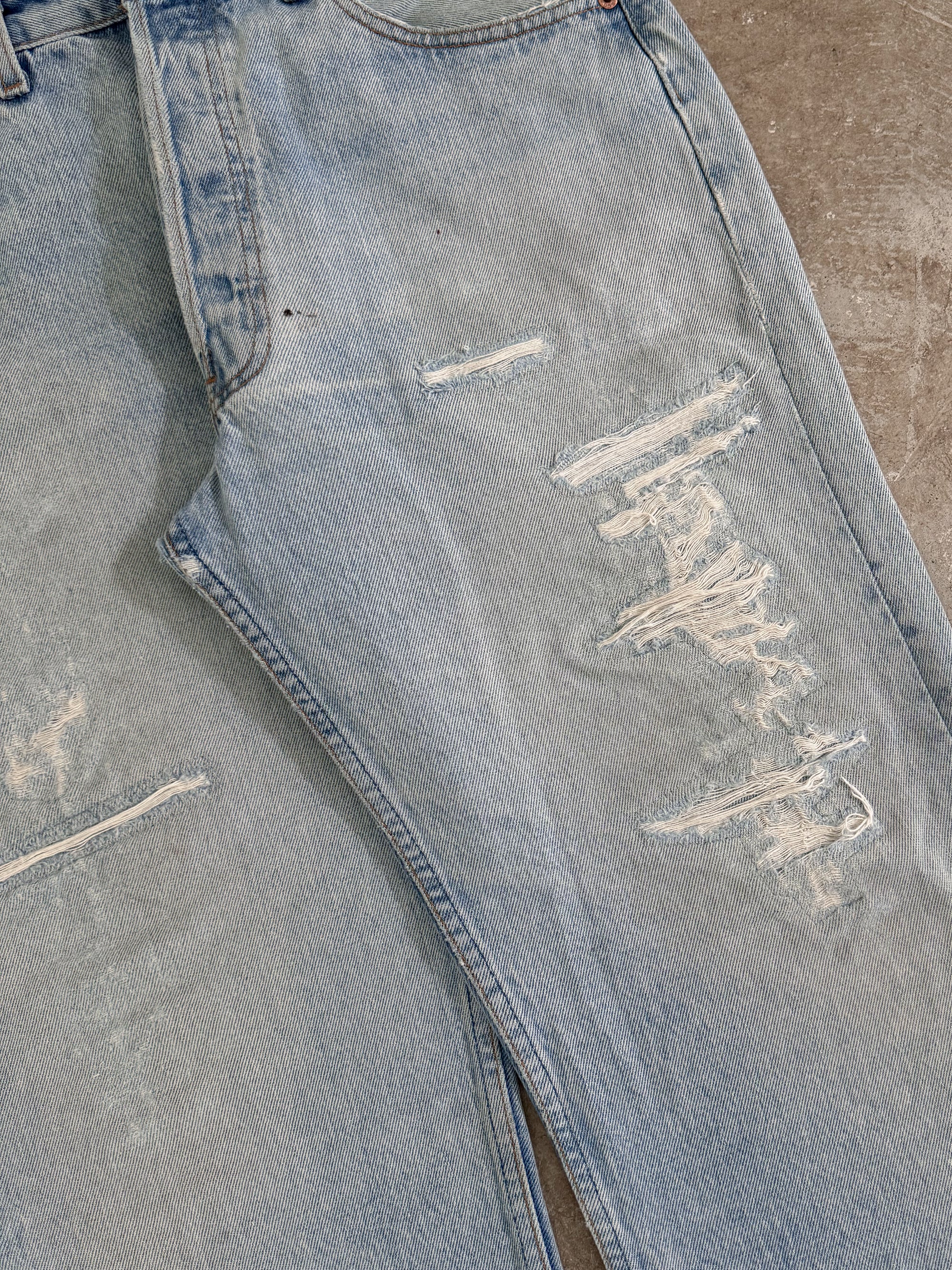 1990s Levis Repaired Faded Blue 501 (32X31)