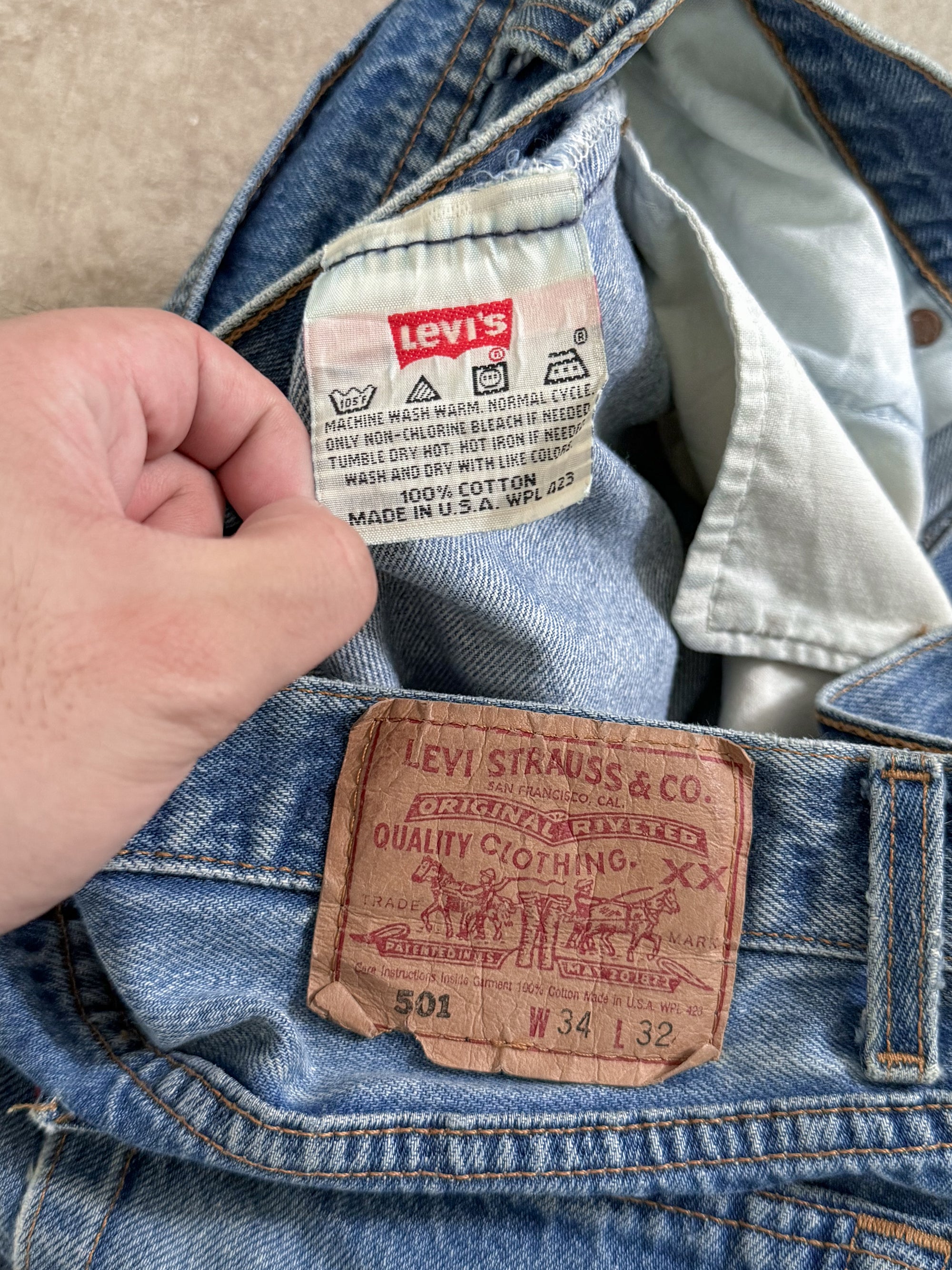 1990s Levis Repaired Faded Blue 501 Released Hem (32X31)