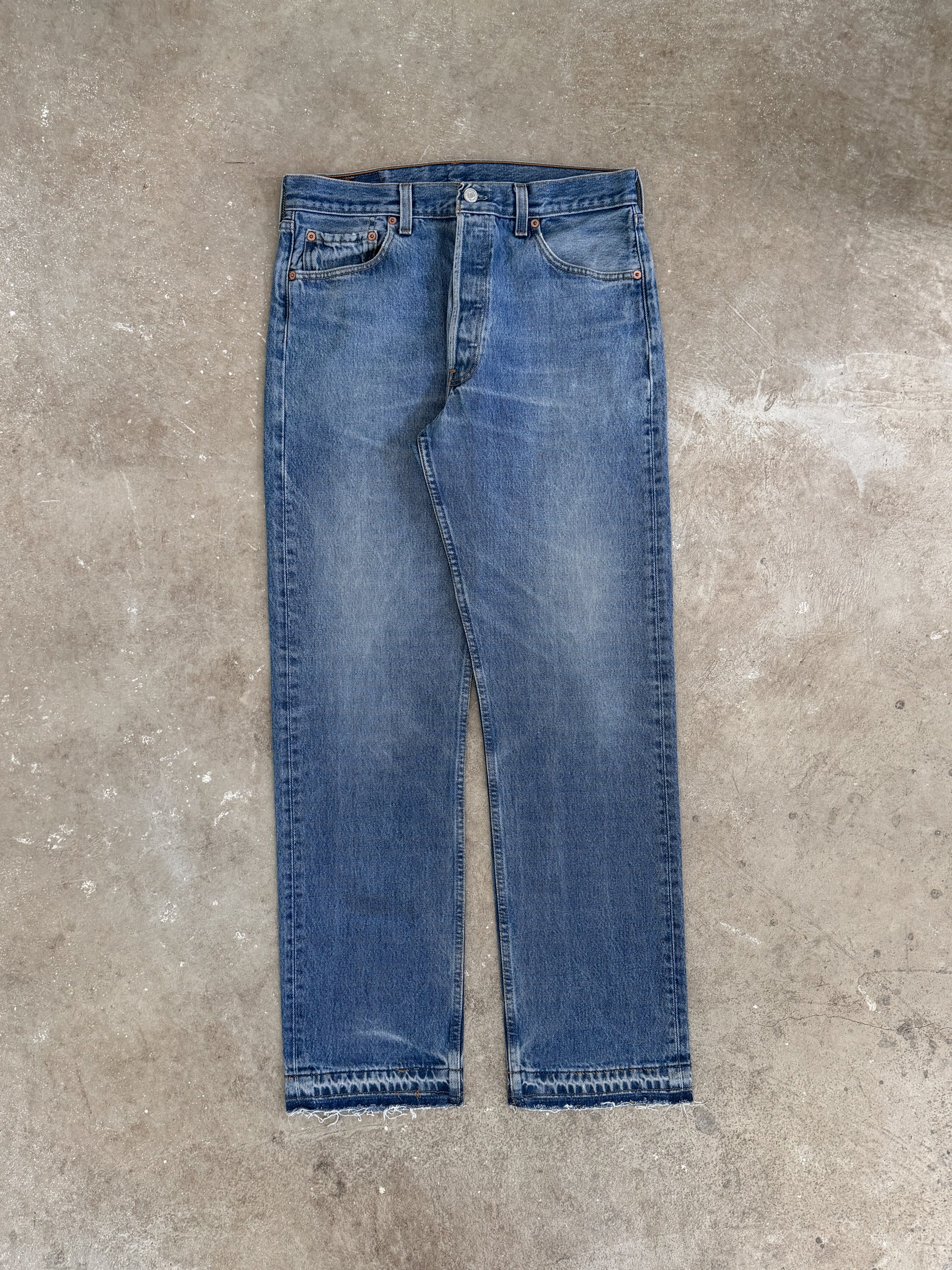 1990s Levis Faded Blue 501 Released Hem (31X31)