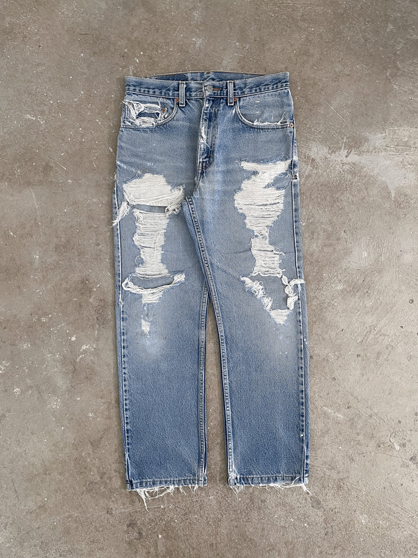 Early 00s Levi’s Thrashed Blue 505 (30X27)