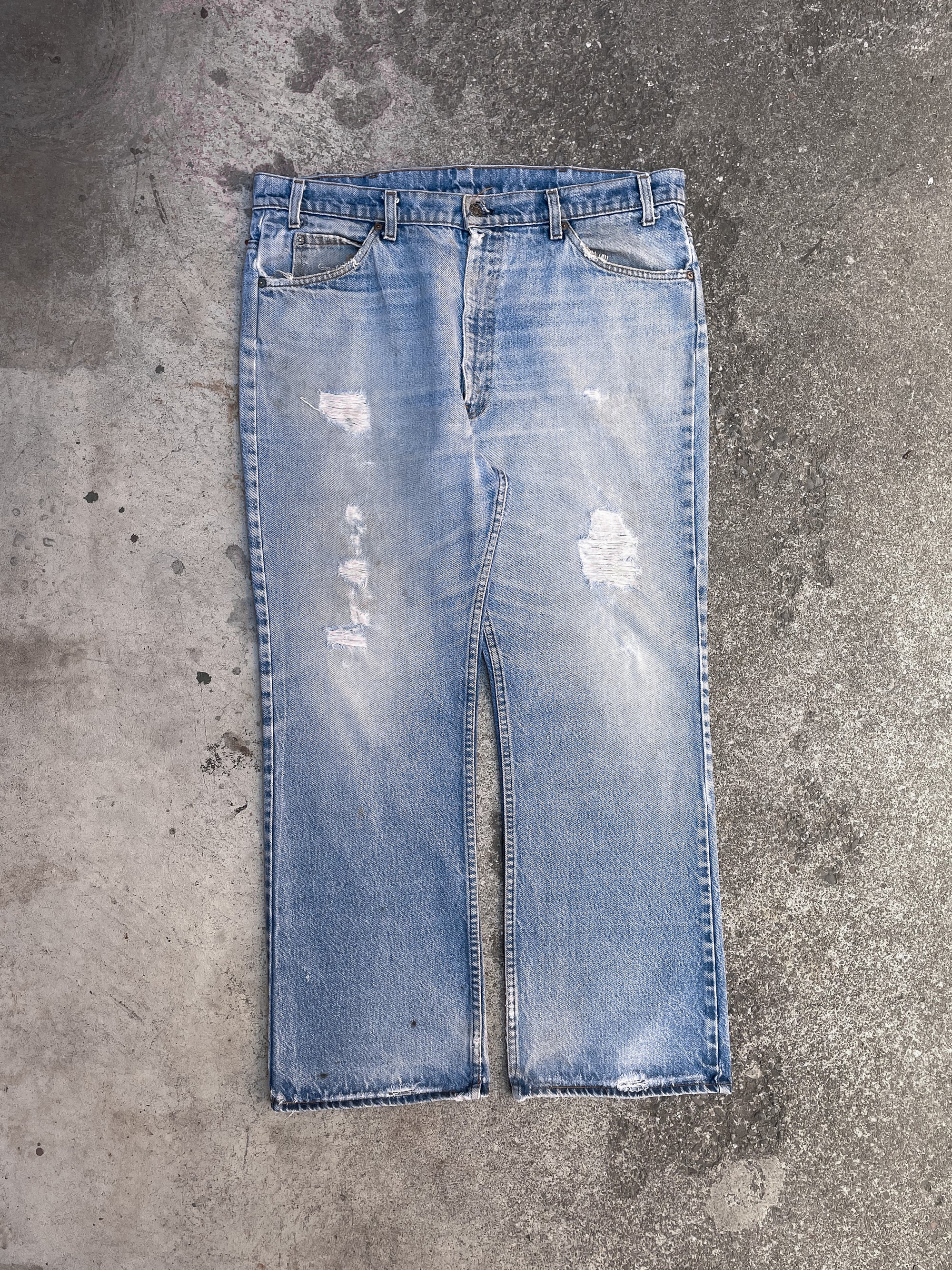 1980s Orange Tab Levi’s Distressed Blue Flared Denim Removed Pocket (38X28)