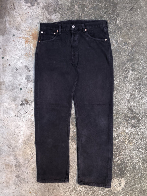 1990s Levis Faded Midnight Oil 501 (33X28)