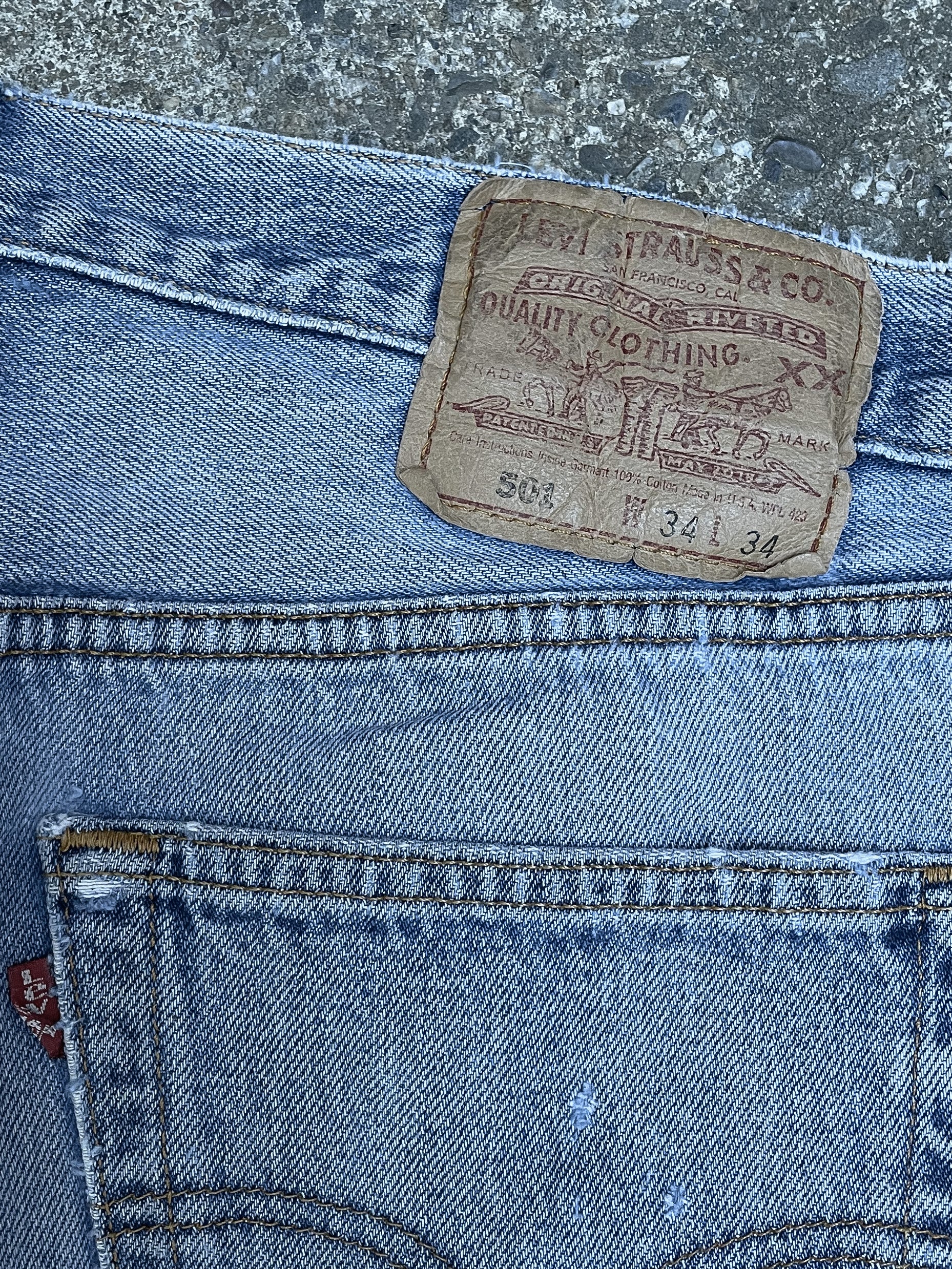 1990s Levi’s Distressed Faded Blue 501 (33X32)