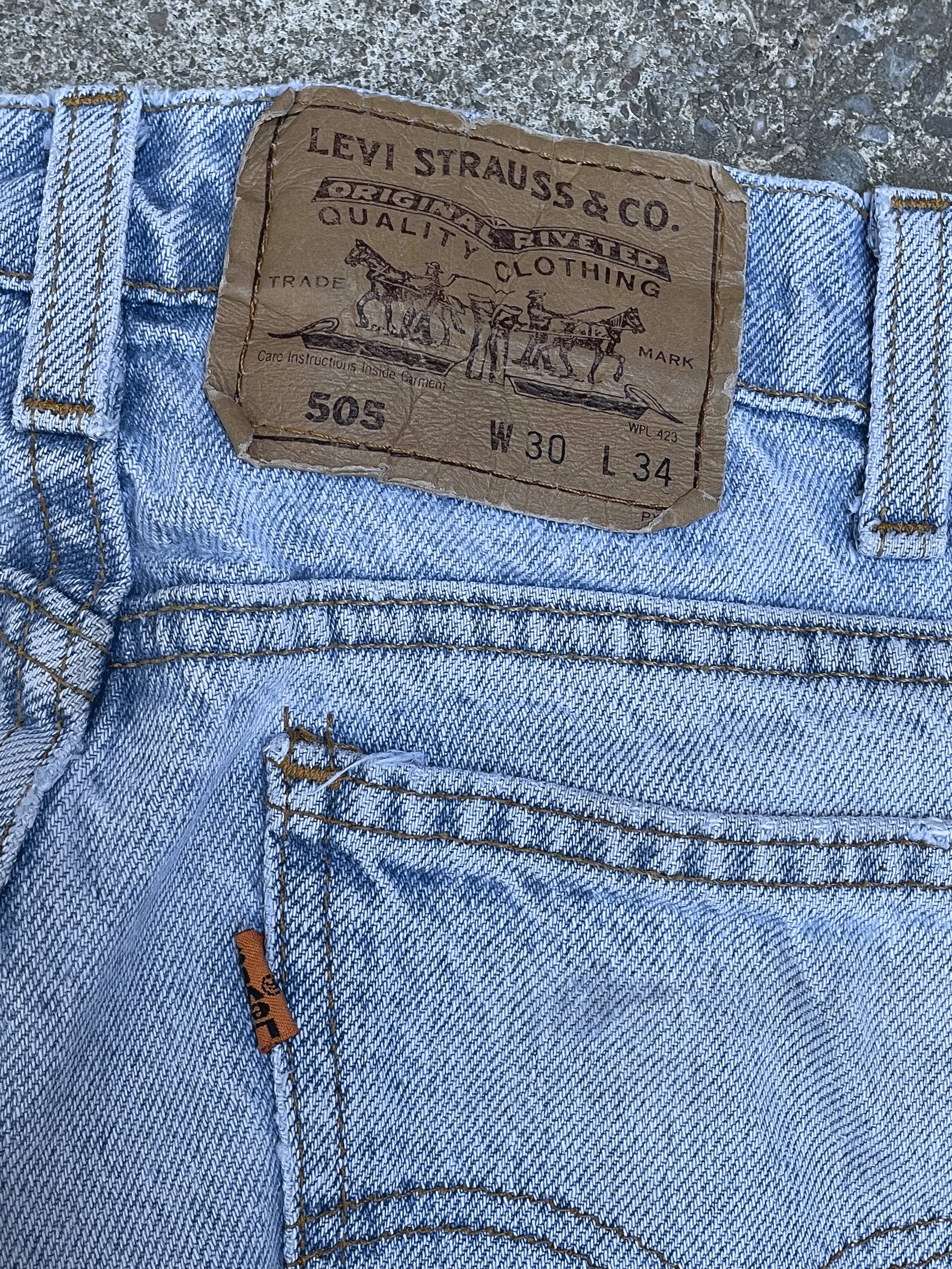 1990s Orange Tab Levi’s Distressed Light Wash Blue 505 (28X32)