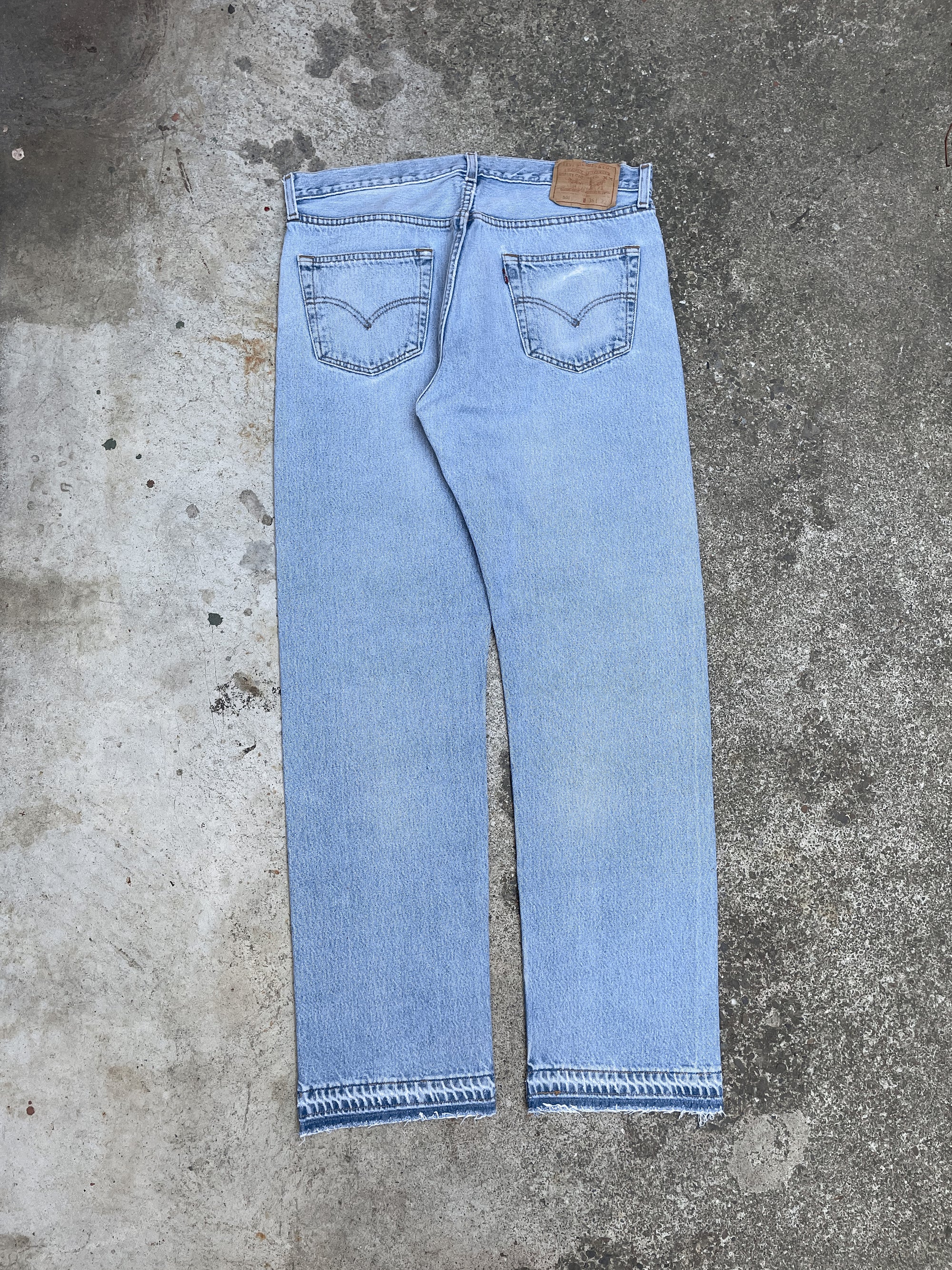 1990s Levi’s Distressed Faded Blue 501 Released Hem (34X31)