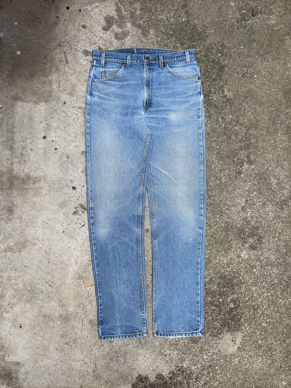 1990s Orange Tab Levi’s Faded Blue 505 (33X33)