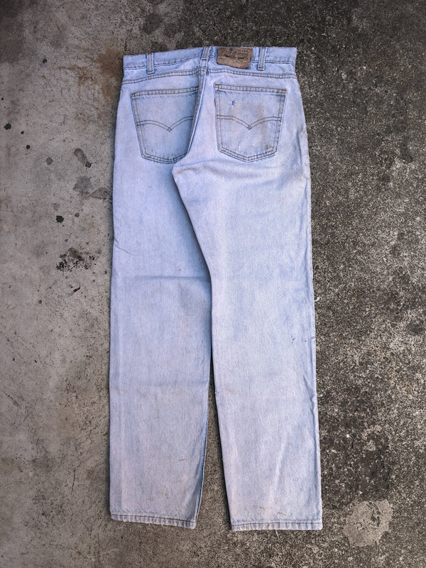 1980s Orange Tab Levis Thrashed Light Wash Blue 506 (28X28)