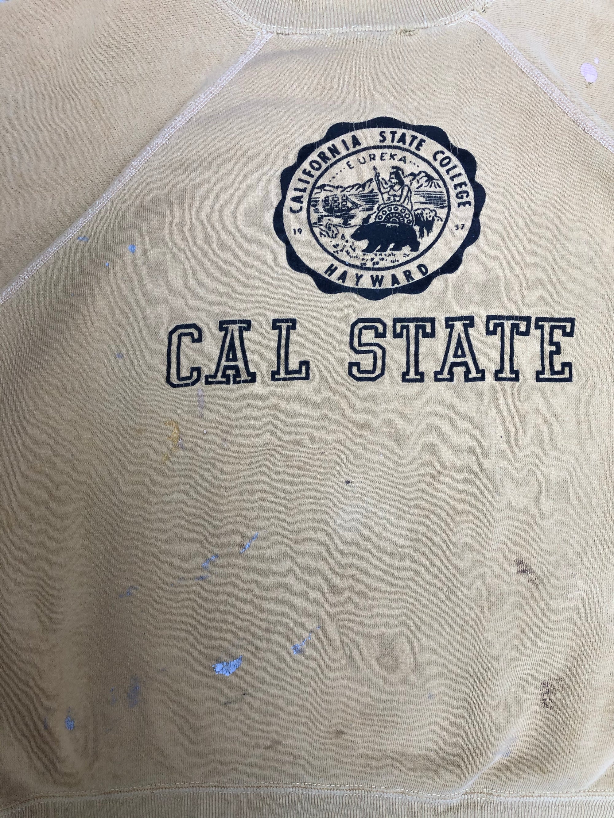 1960s Faded Painted Yellow “Cal State Hayward” Short Sleeve Raglan Sweatshirt