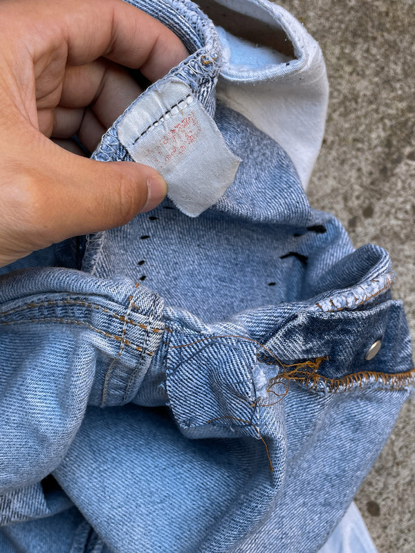 1980s Levi’s “Do Your Thing” Patched Faded Blue 501 Raw Hem (29X23)