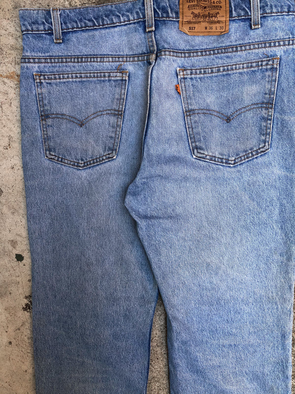 1990s Orange Tab Levis Faded Blue 517 (35X27)