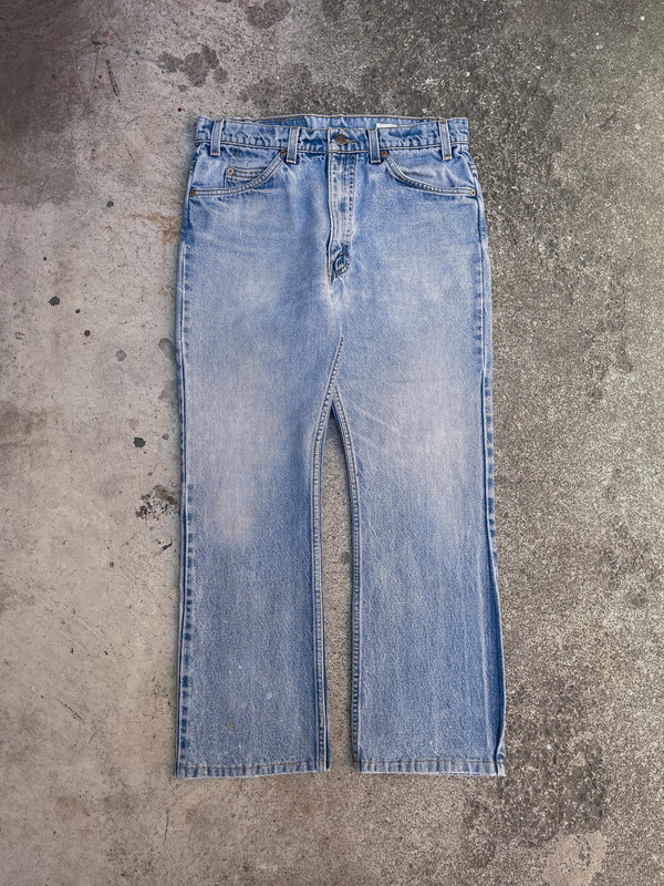 1990s Orange Tab Levis Faded Blue 517 (31X26)