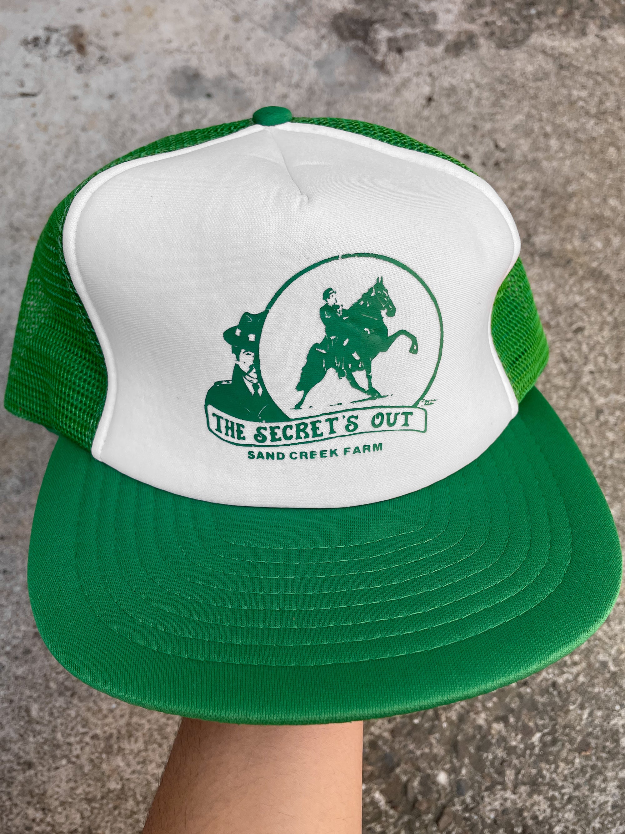 1990s “The Secret’s Out” Trucker Hat