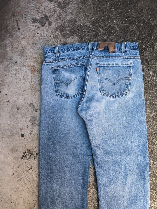 1990s Orange Tab Levis Faded Blue 505 Released Hem (35X27)